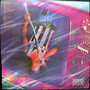 Brian Johnson and Geordie (back cover)